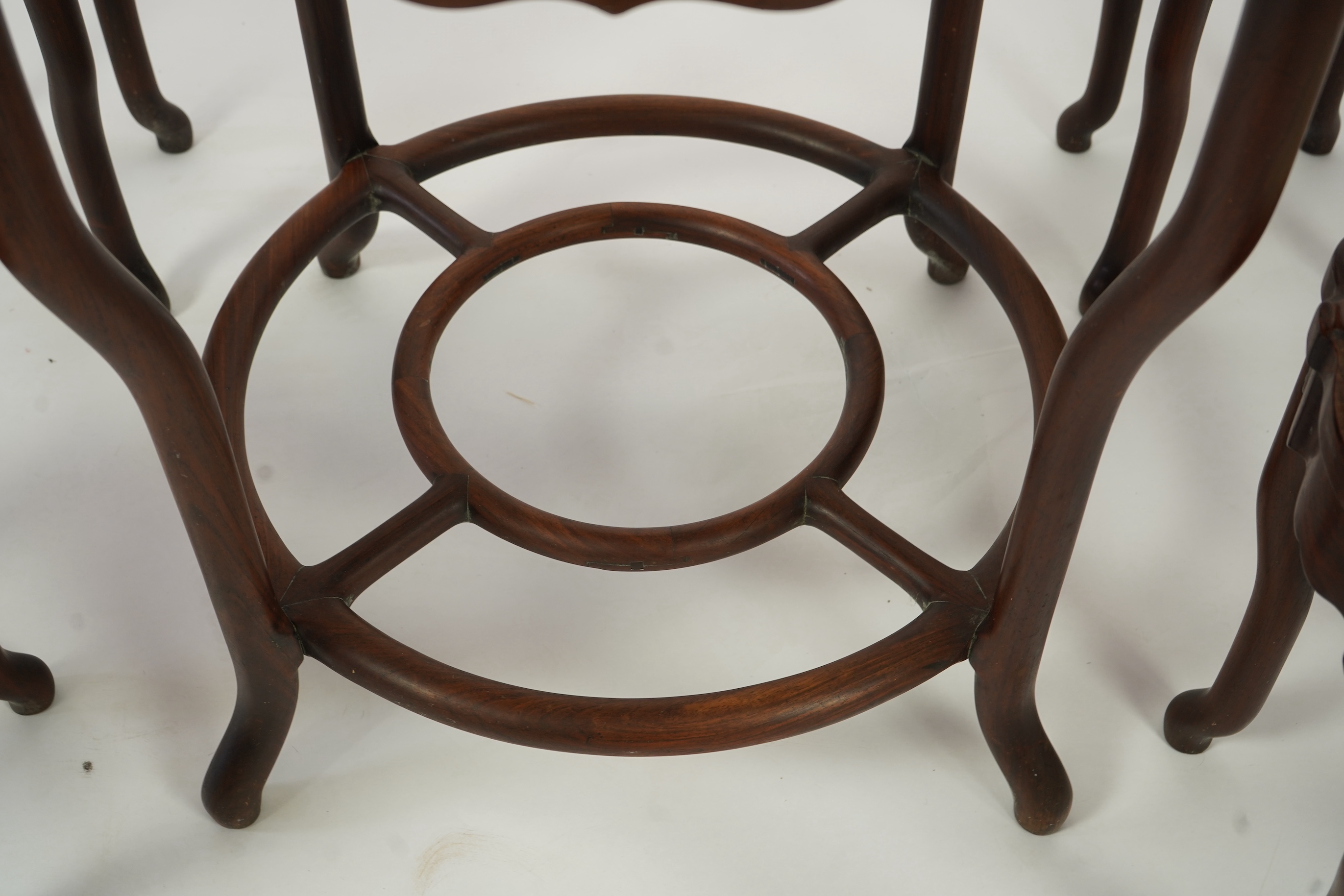 A Chinese dreamstone marble inset hongmu table and four matching stools
